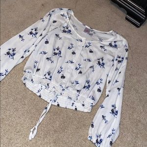 White blouse with blue flowers